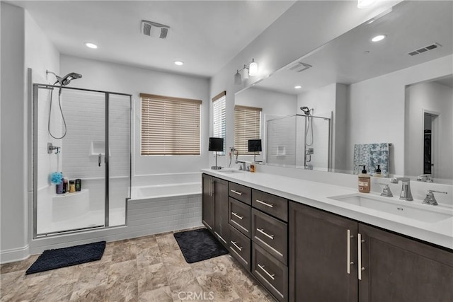 24469 Paxton Ln, Lake Elsinore, CA 92532 - bathroom with a stall shower, double vanity, a garden tub, and recessed lighting
