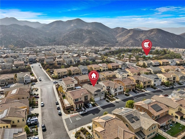24469 Paxton Ln, Lake Elsinore, CA 92532 - aerial overview of property's location with nearby suburban area and a mountain backdrop