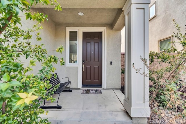 24469 Paxton Ln, Lake Elsinore, CA 92532 - doorway to property with stucco siding
