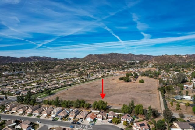 drone / aerial view featuring a mountain view