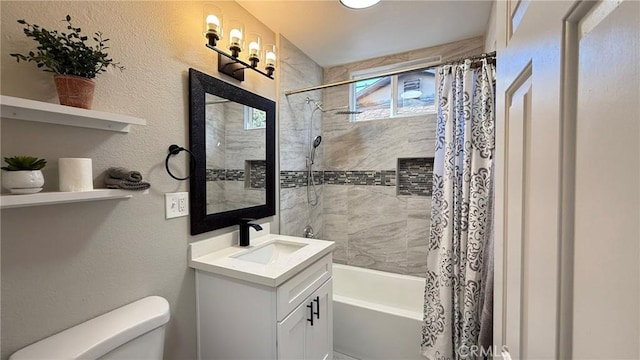 full bathroom with toilet, shower / bath combo, and vanity