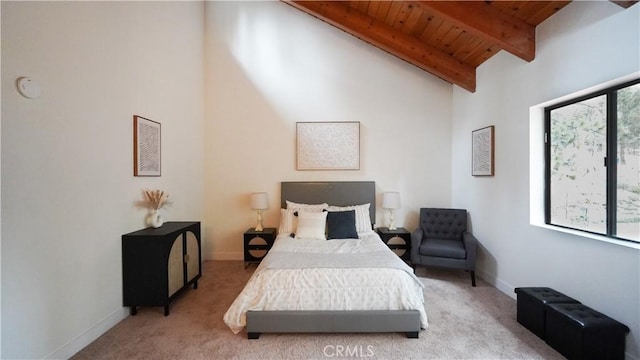 bedroom featuring light carpet, wooden ceiling, and lofted ceiling with beams