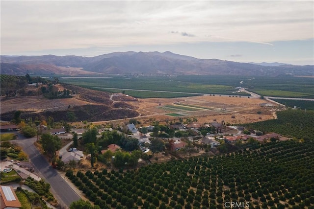 drone / aerial view with a mountain view and a rural view