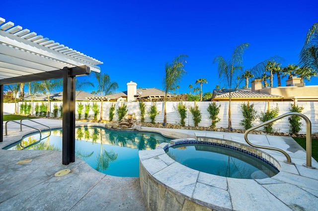 view of pool with a pergola and an in ground hot tub