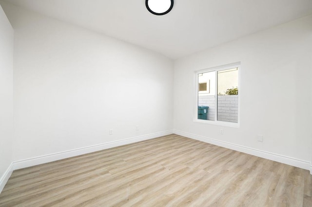 unfurnished room featuring light hardwood / wood-style floors