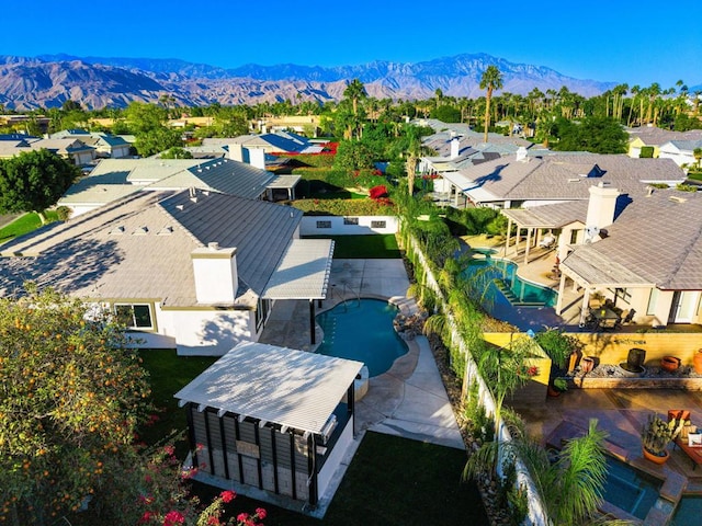 bird's eye view with a mountain view