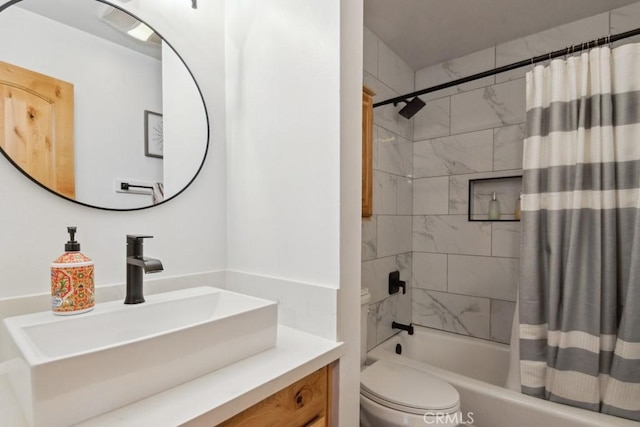 full bathroom with toilet, vanity, and shower / tub combo with curtain