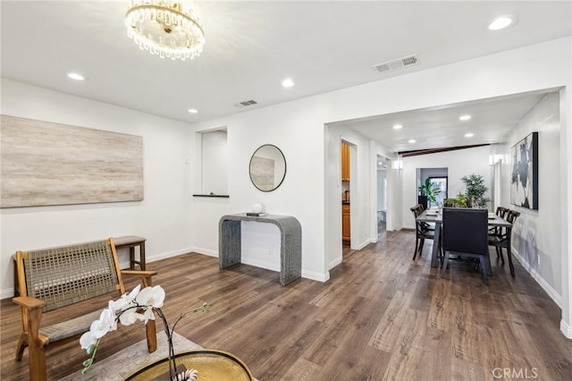 interior space featuring visible vents, dark wood-type flooring, and recessed lighting