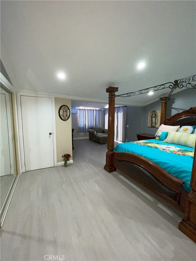 unfurnished bedroom featuring crown molding and wood-type flooring