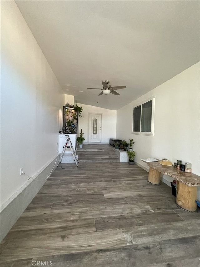 exterior space with ceiling fan