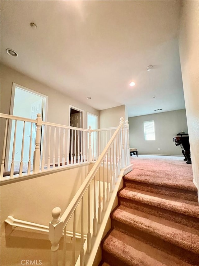 stairs with carpet floors