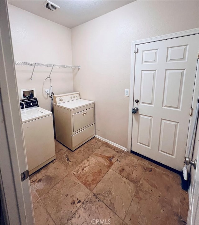 laundry area featuring washer and dryer