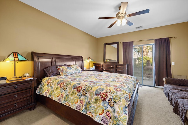 carpeted bedroom with ceiling fan and access to outside