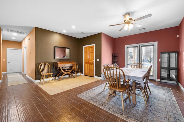 dining room with ceiling fan and french doors