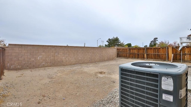 view of yard with central AC