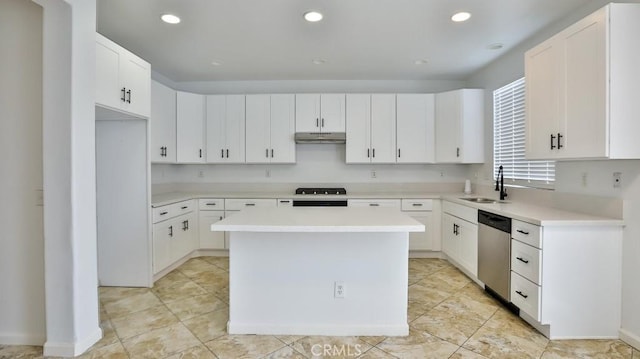 kitchen featuring sink, white cabinetry, dishwasher, and a kitchen island