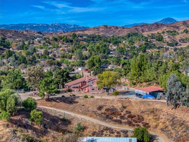 drone / aerial view featuring a mountain view