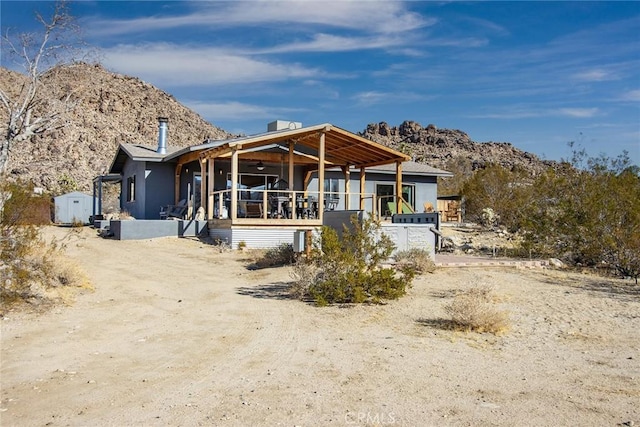 view of front of home featuring covered porch