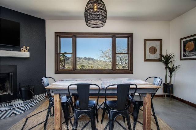 dining area with concrete flooring