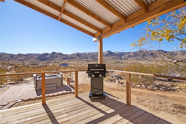 wooden terrace with a mountain view