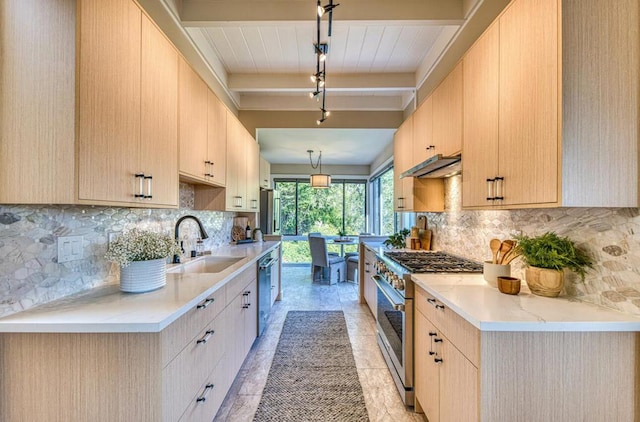 kitchen with light brown cabinetry, pendant lighting, stainless steel appliances, and beamed ceiling