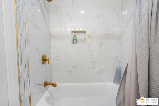 bathroom with shower / bathtub combination with curtain