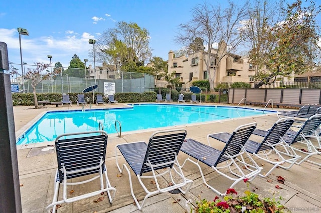 view of swimming pool featuring a patio