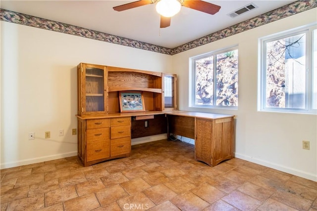 office space with ceiling fan