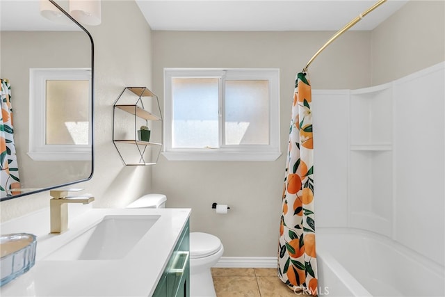 full bathroom featuring toilet, vanity, tile patterned flooring, and shower / tub combo