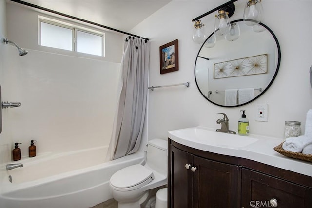 full bathroom featuring toilet, vanity, and shower / bath combination with curtain