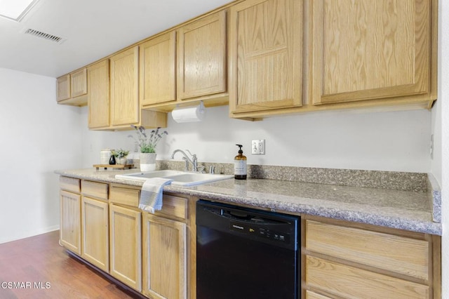 kitchen with dark hardwood / wood-style floors, dishwasher, sink, and light brown cabinetry