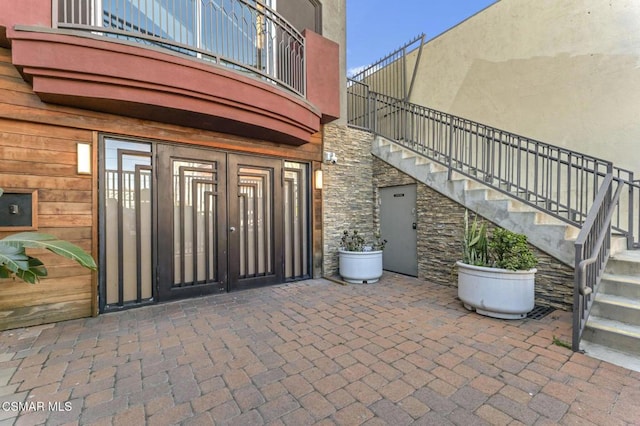 property entrance with a patio area