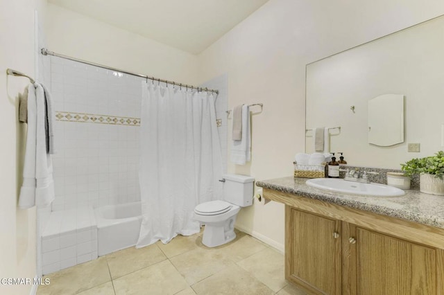 full bathroom with tile patterned floors, vanity, toilet, and shower / bath combo with shower curtain