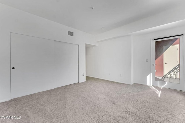 empty room featuring carpet