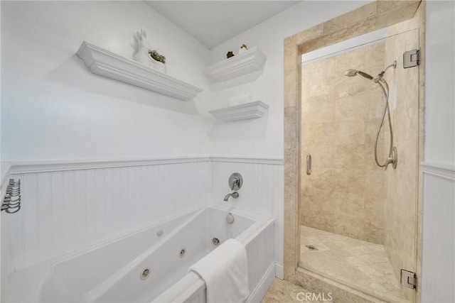 bathroom featuring plus walk in shower