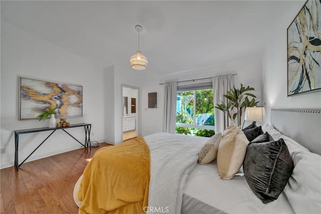 bedroom with wood-type flooring