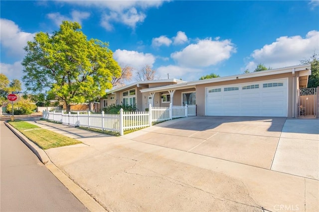 ranch-style house featuring a garage