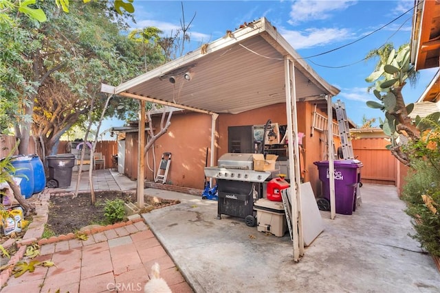 rear view of property with a patio