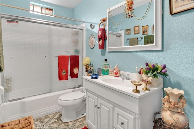 full bathroom with toilet, combined bath / shower with glass door, an inviting chandelier, and vanity