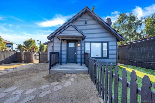 view of front of property with a front lawn