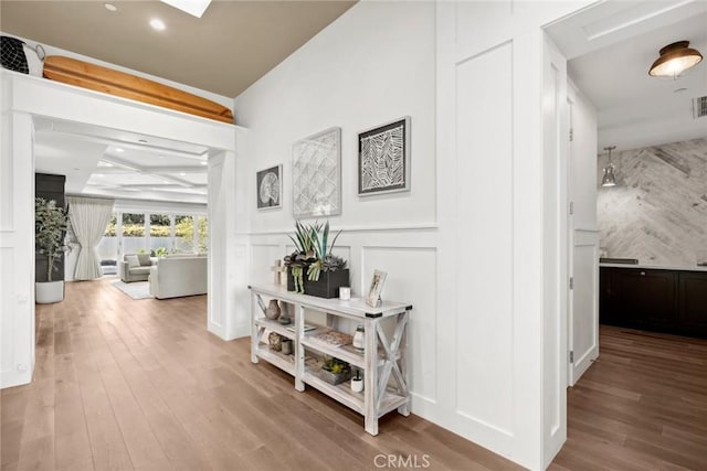 hallway featuring hardwood / wood-style floors