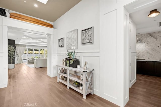 hallway featuring hardwood / wood-style floors