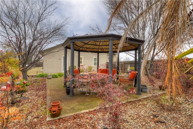 view of yard featuring a patio area and a gazebo