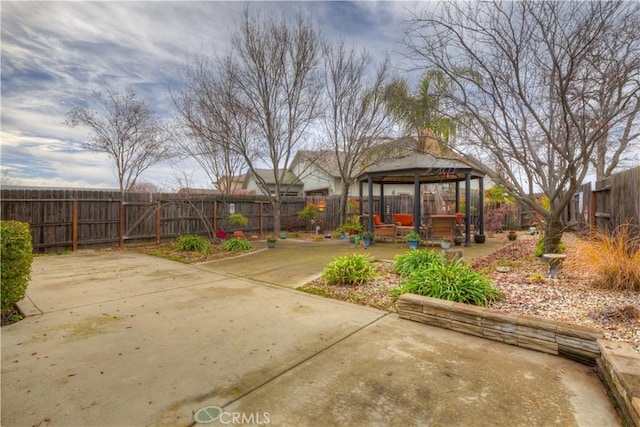 view of yard with a gazebo and a patio