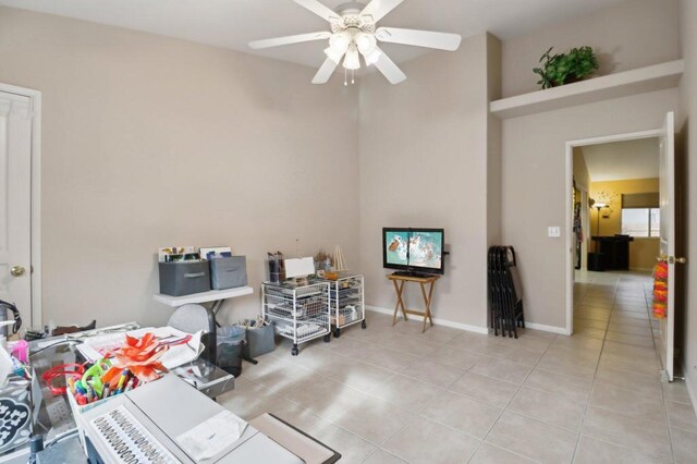 miscellaneous room featuring ceiling fan and light tile patterned flooring