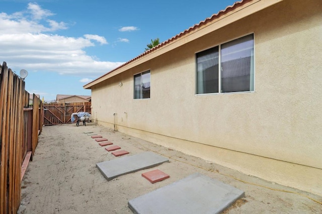 view of home's exterior with a patio area