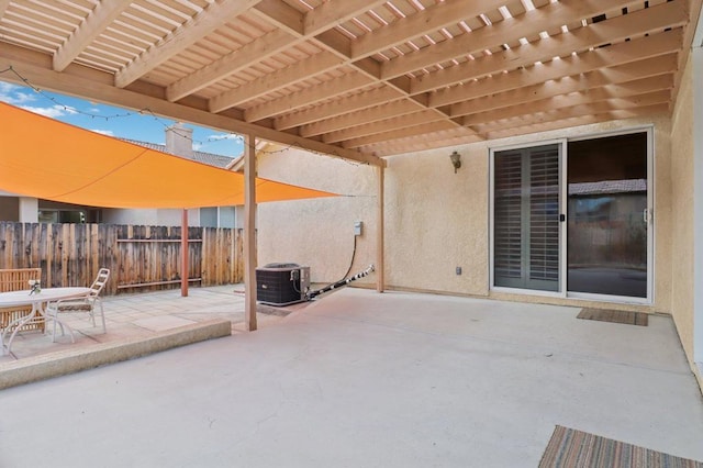 view of patio / terrace with a pergola and central AC