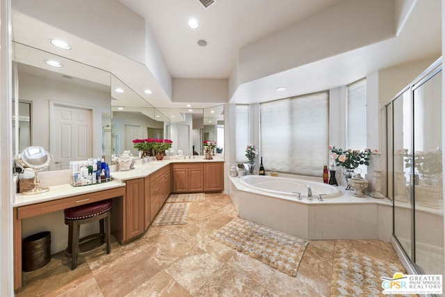 bathroom with plus walk in shower and vanity