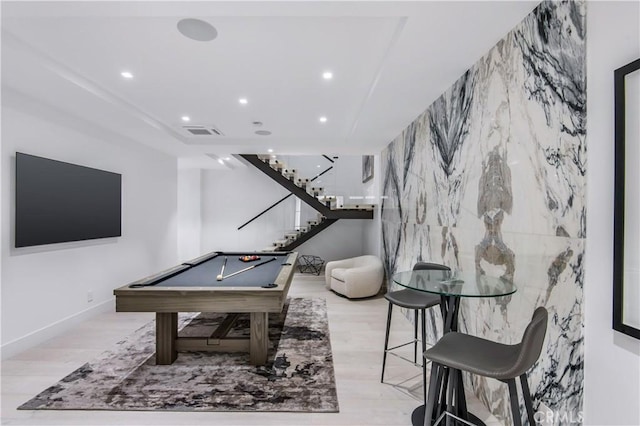 game room with billiards, tile walls, and light hardwood / wood-style floors