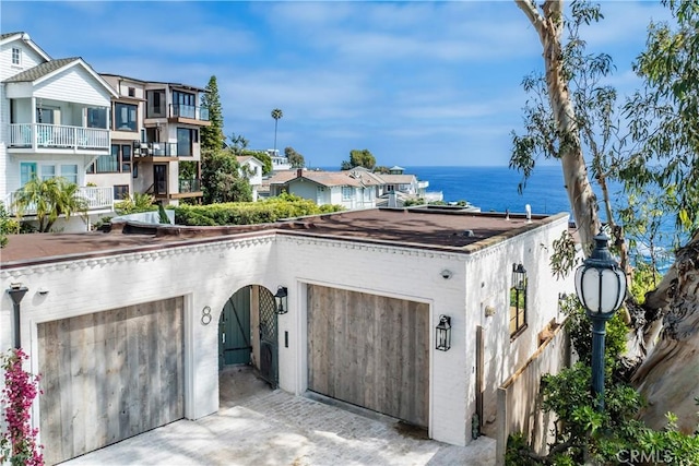 view of front of house featuring a water view